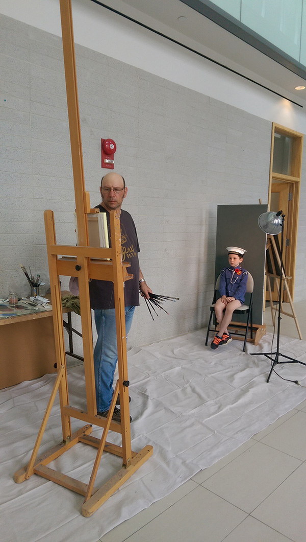 2015 City of Guelph Artist in Residence, Greg Denton, with project participant, Aurora Yorston.