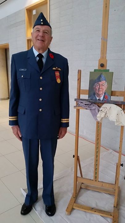 J. Al Watt of the Royal Canadian Air Force stands beside his portrait. #004/100 in the 100 Portraits/100 Poppies project. Guelph City Hall. July 7, 2015.
