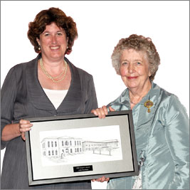 Judy Coulman receiving an award from Mayor Farbridge