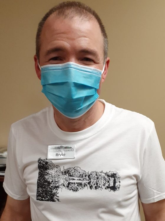 A photo of the participant wearing the silkscreened t-shirt