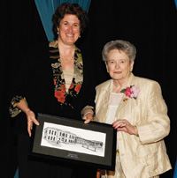 Eileen Hammill receiving award from Mayor Farbridge