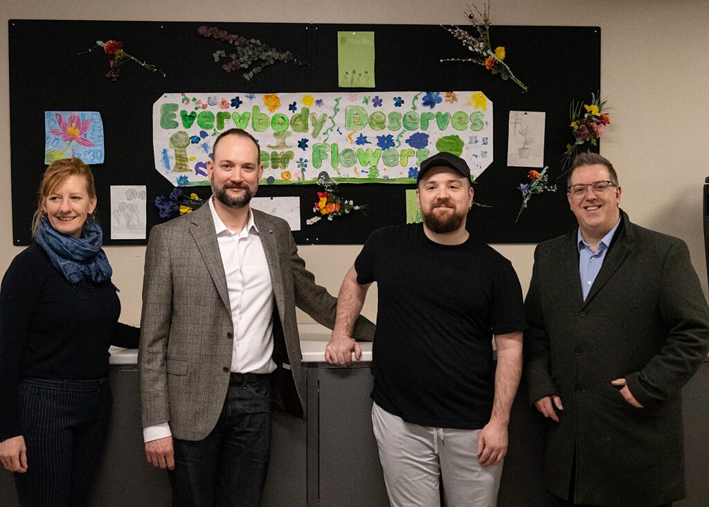 Group photo of Stepping Stone staff and City of Guelph Mayor Cam Guthrie