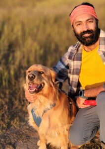 Guruasish, the owner of Trek Nirvana and his dog Murphy posing for the camera.