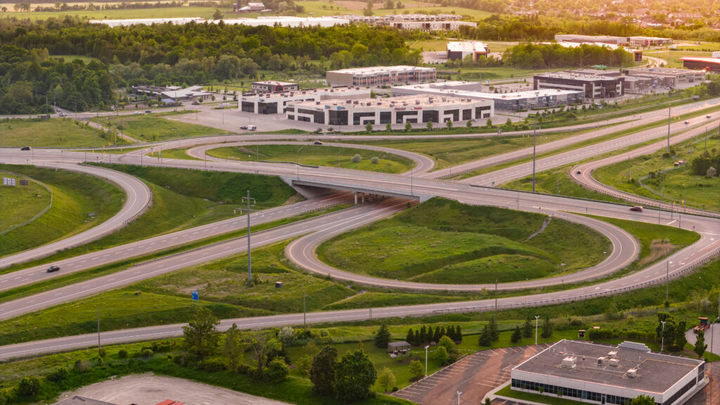 aerial view of a piece of property featuring intertwined roads