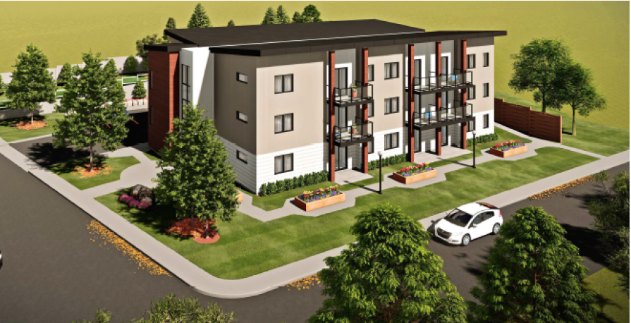 View from the intersection of Edinburgh Road and Preston Street facing northwest, showing the front and side of three-storey building, including balconies, with landscaped pathways.