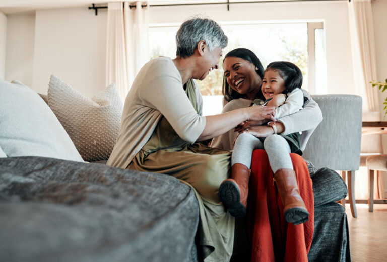three people on a couch
